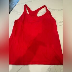 Dicks sporting goods. Ribbed built in support tank.  Used condition.